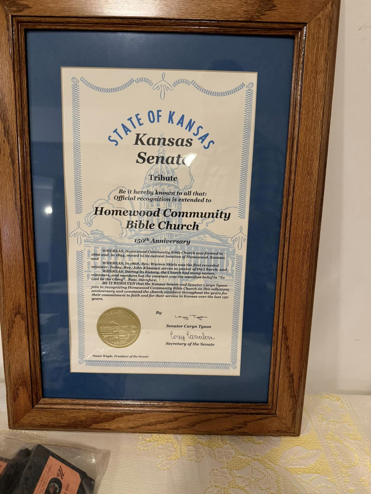 certificate from the state of Kansas recognizing church has been established for 150 years